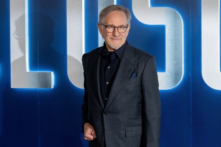 A descriptive image of a UFO in the sky, with the sun setting in the background, symbolising the disclosure of truth and the connection to Close Encounters, a film by Steven Spielberg that explores the possibility of extraterrestrial life and the behaviour of those who encounter it