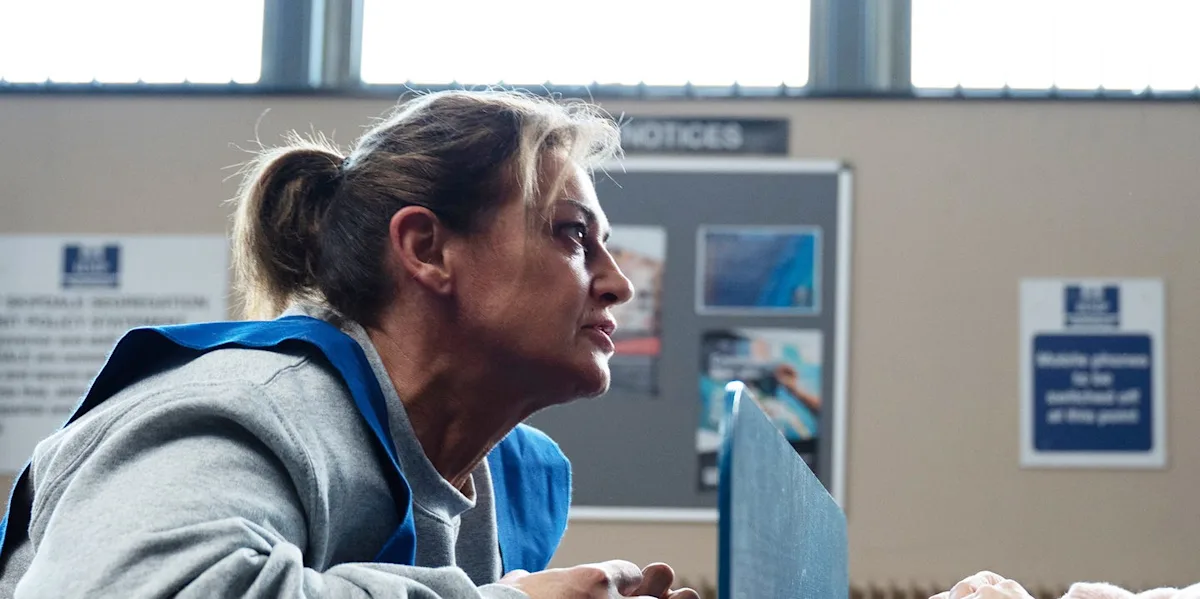 Emmerdale's Moira and Kim standing together, looking concerned, with a dramatic village backdrop, as they face their new reality and a permanent change that will impact their behaviour and relationships, with a mix of colour and emotion