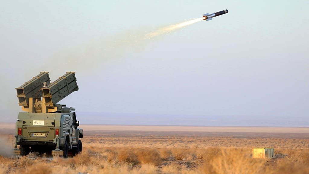 Iranian missiles being launched in retaliation to US strikes, with a focus on the primary keyword 'missile strikes'