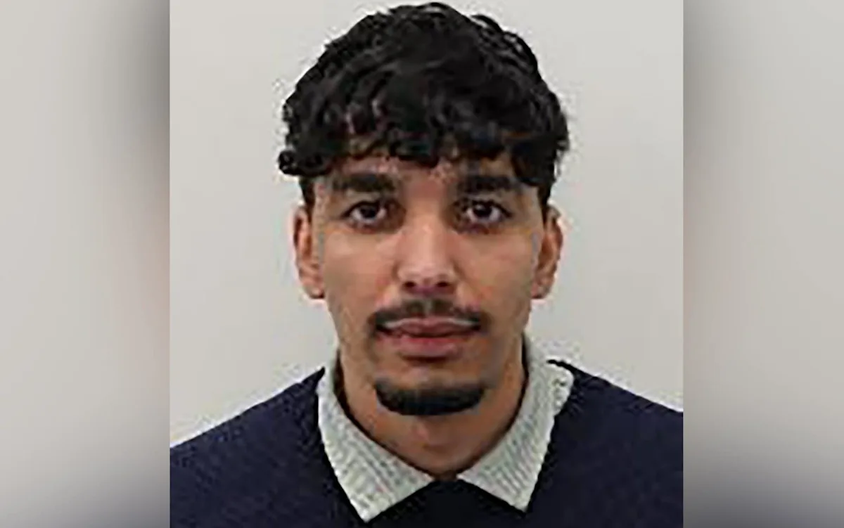 A person wearing a luxury watch, with a concerned expression, symbolising the risk of watch theft in the UK, with a blurred background of a city street, highlighting the need for vigilance and watch insurance