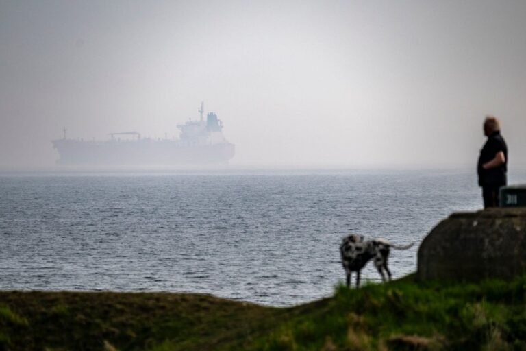 A Royal Navy vessel intercepts a Russian shadow fleet tanker in the English Channel, as part of efforts to enforce international law and prevent illicit activities, with the UK armed forces taking bold action to protect its interests