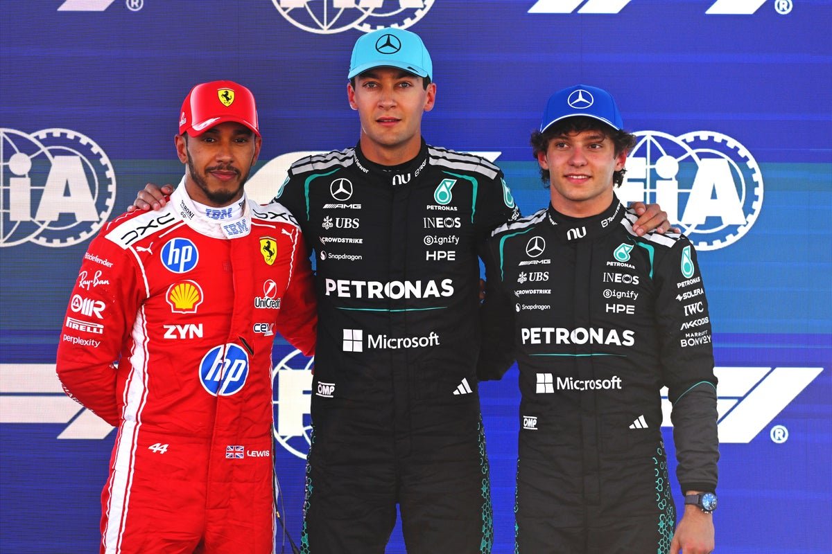 Formula 1 cars lined up on the starting grid, ready to race at the Barcelona-Catalunya Grand Prix, with a focus on the primary keyword phrase Barcelona-Catalunya Grand Prix
