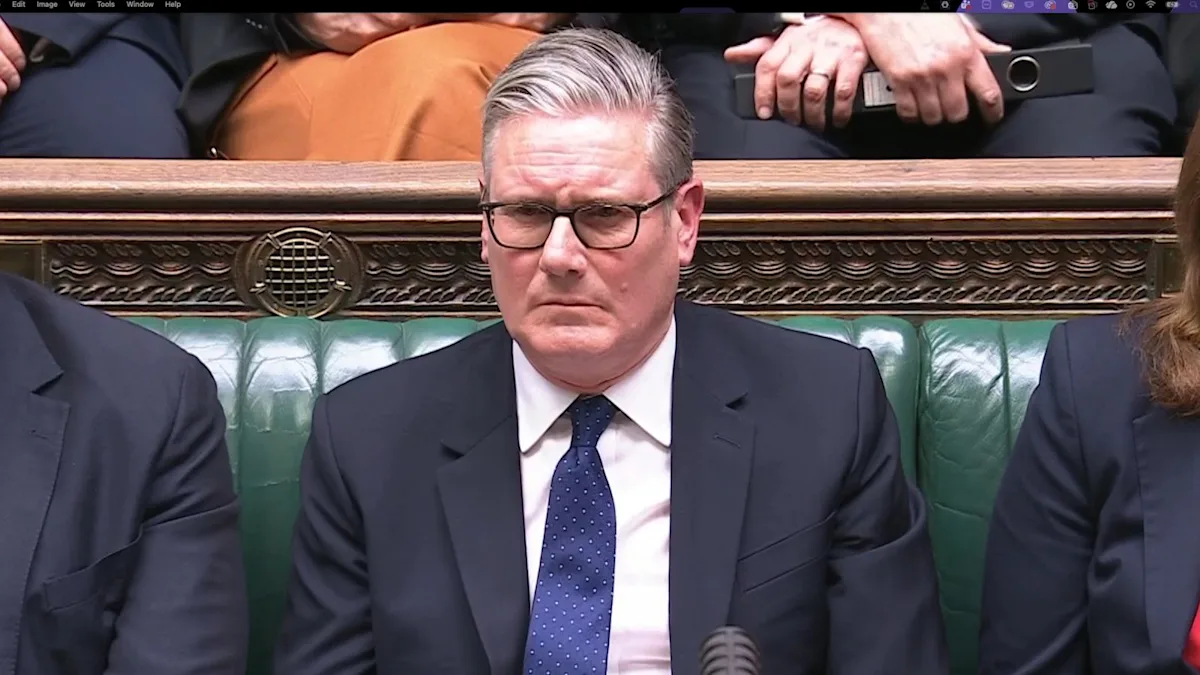 Keir Starmer speaking at a Labour Party conference, with a crowd of supporters in the background, as he seeks to recover from the Mandelson debacle and restore faith in his leadership, with a renewed sense of purpose and a commitment to social justice and equality