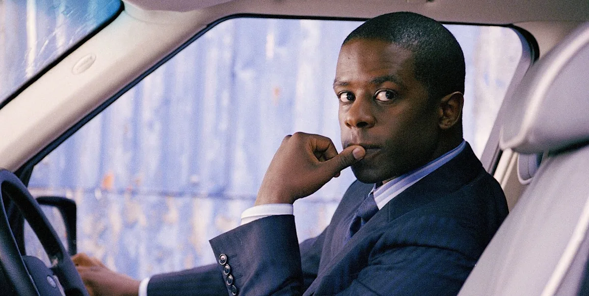 A gripping BBC crime drama scene, with a detective analysing clues, surrounded by a dark and mysterious atmosphere, with a hint of colour and depth, showcasing the primary keyword BBC crime drama