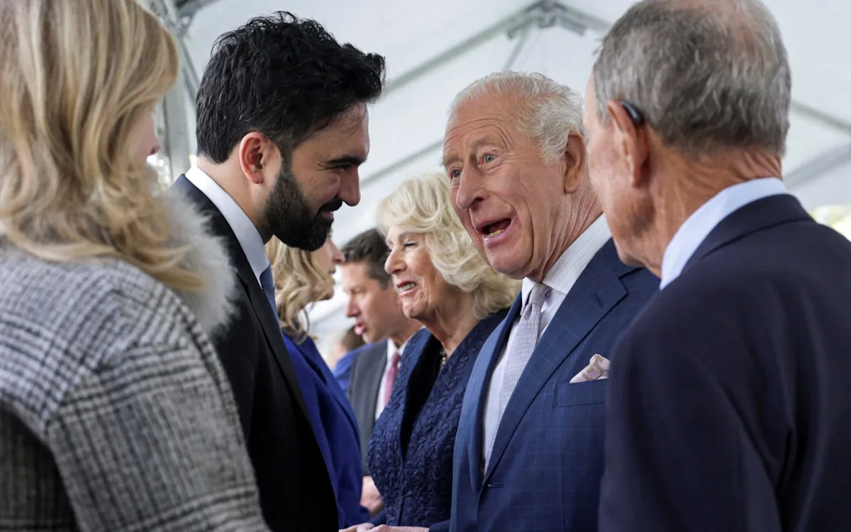 King sparkles in New York, with socialist mayor Mamdani looking on, as the city's skyline shines in the background, with the king's crown jewel at stake, and the people of New York watching with interest, as the situation unfolds, and analysts predict the outcome, with the city's fast-paced and ever-changing environment, and the king's behaviour during his visit, and the colour of politics, and the king's legacy, and the city's entertainment and politics, with the king's sparkle evident throughout, and the people of New York eager to see what the future holds
