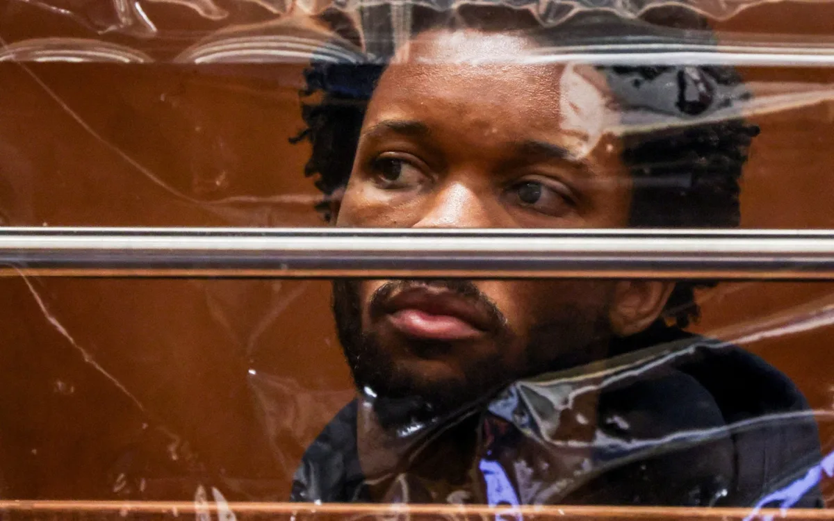 A singer in a recording studio, with a chainsaw in the foreground, symbolising the allegations of abuse and violence, with a teenager in the background looking frightened and intimidated, highlighting the primary keyword phrase singer abuse