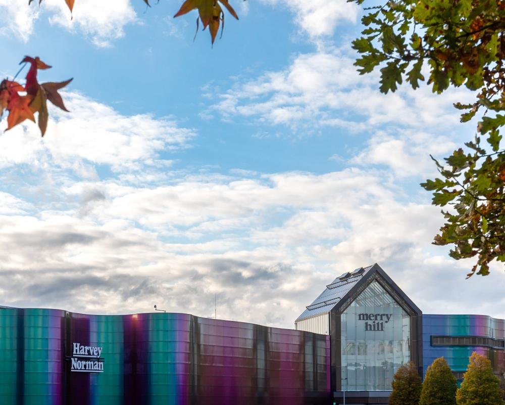 UK high street with bustling shops