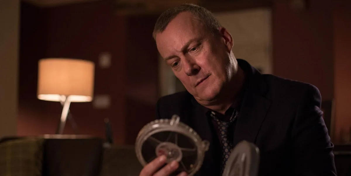 A gritty and intense image of a Yorkshire detective standing in front of a crime scene, with a determined look on their face, symbolising the show's unique blend of suspense and intrigue, with a focus on British police drama