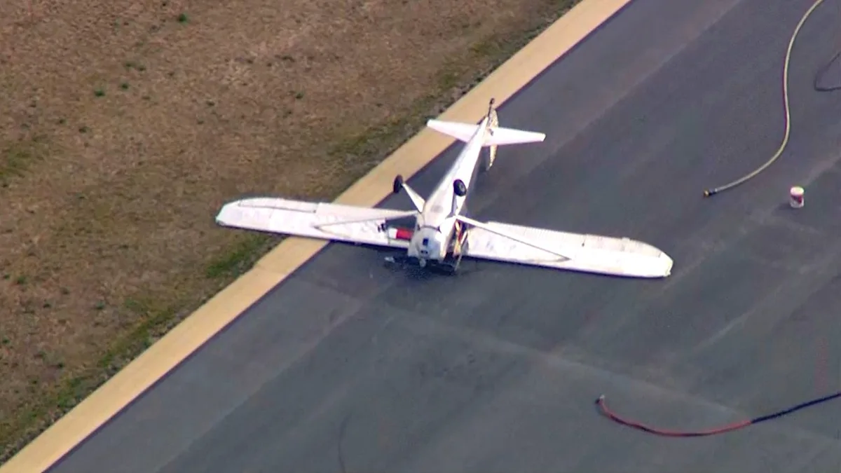 A small plane has crashed onto its roof at Cape Cod airport in Massachusetts, with debris scattered across the runway, highlighting the need for increased air safety measures, particularly in relation to plane crash incidents
