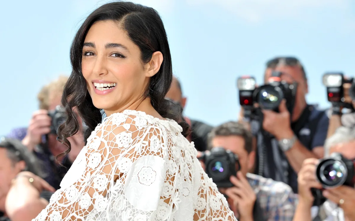 French President Emmanuel Macron and his wife in a shocking slap incident prompted by a message from a pretty actress, sparking a heated debate about their behaviour and relationship