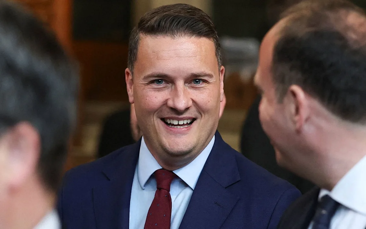 Labour Party leadership contenders David Miliband and Wes Streeting pose for a photo with Keir Starmer, as they prepare to battle it out for the top spot in the upcoming leadership contest, with a focus on Labour Party leadership