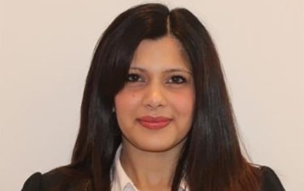 solicitor working long hours at desk