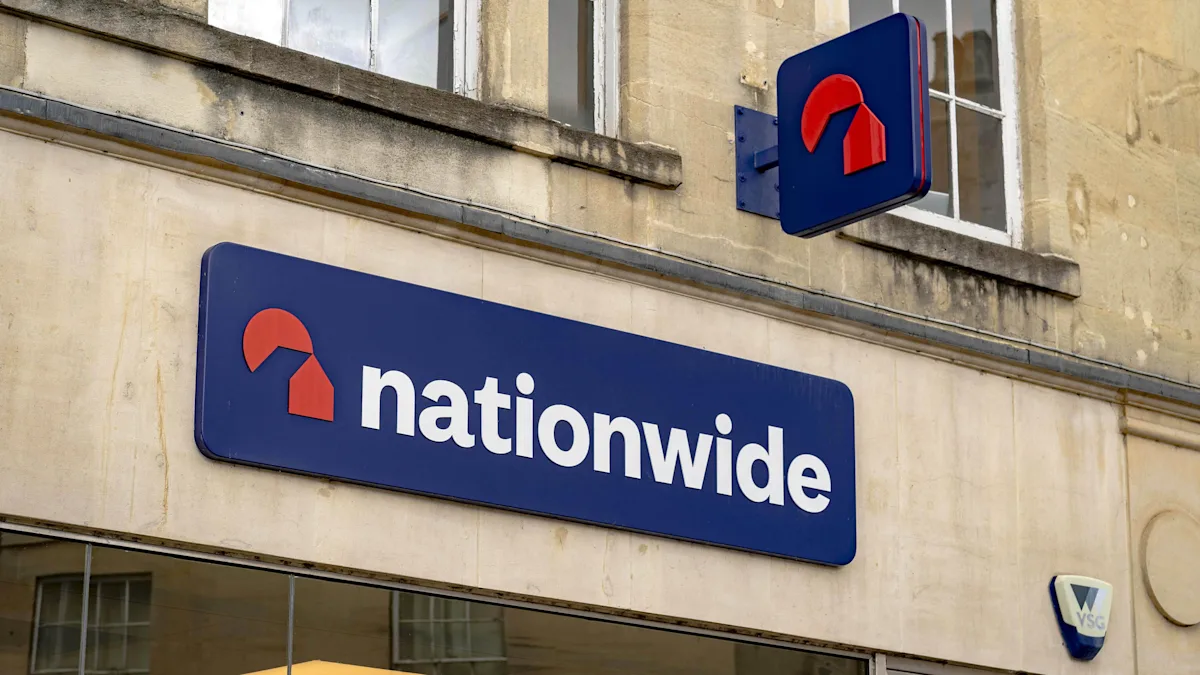 Nationwide building society logo with a background of happy customers, representing the company's commitment to customer satisfaction and the new £100 bonus