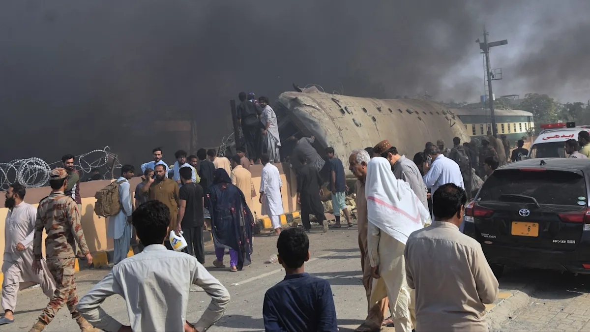 A damaged train in Pakistan after a bomb attack, with rescue workers and debris scattered around, highlighting the devastating impact of terrorism on public transportation