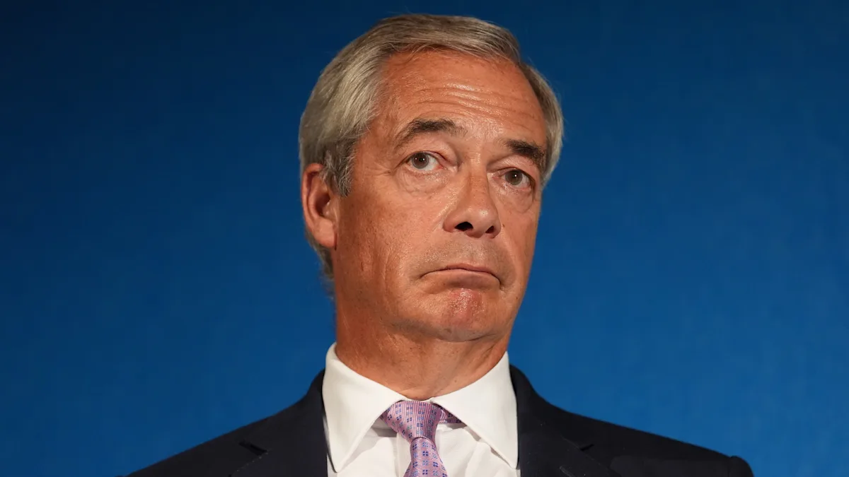 Nigel Farage speaking at a public event, with a caption referencing the airport trial and Attorney General referral, highlighting the significance of the case and its impact on the legal system