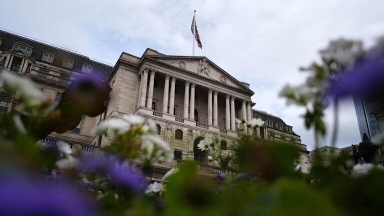 FTSE 100 index rising after Bank of England rate cut