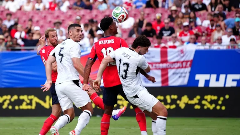 England and Scotland players in action during their World Cup warm-up games, displaying impressive skill and behaviour on the pitch, with a notable colour scheme