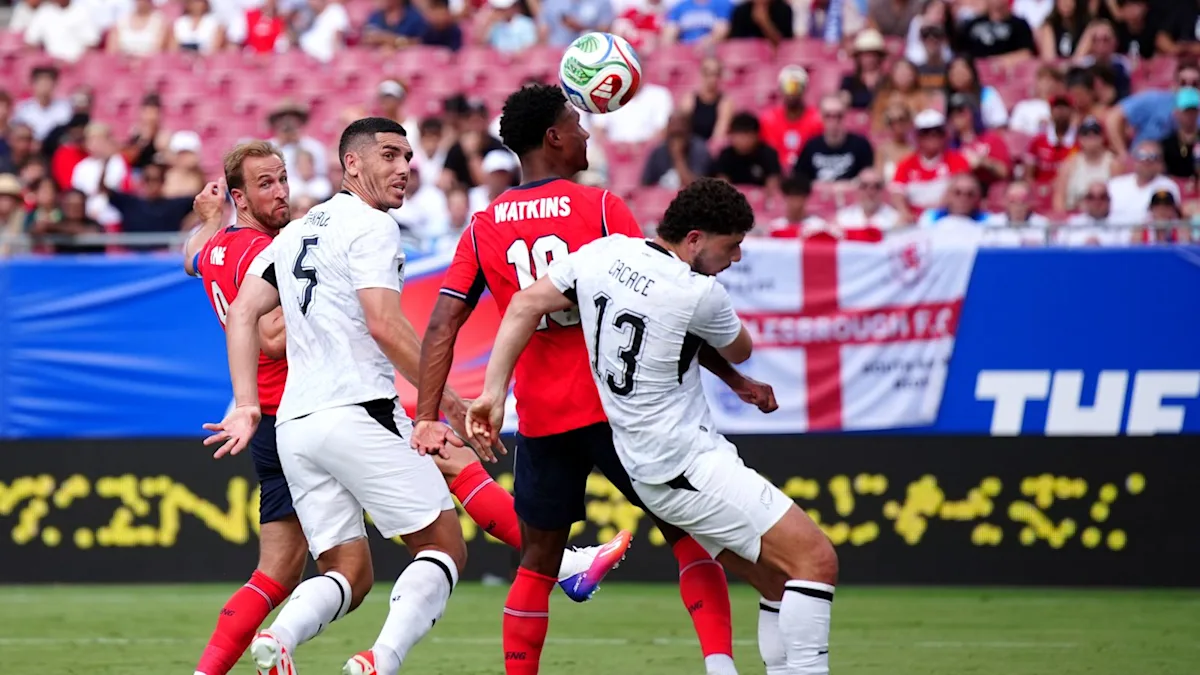 England and Scotland players in action during their World Cup warm-up games, displaying impressive skill and behaviour on the pitch, with a notable colour scheme