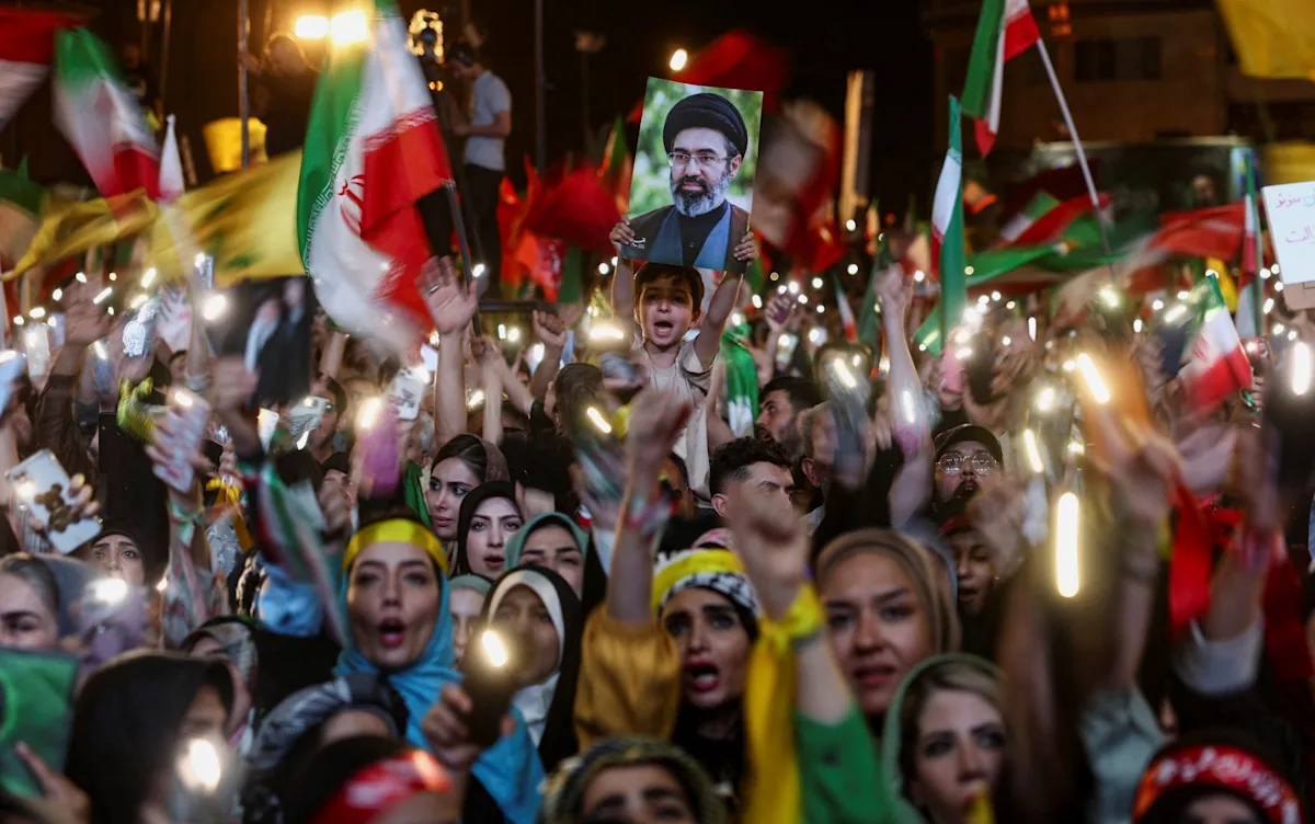 A dramatic image of the Middle East landscape, with a subtle hint of the Iranian flag in the background, symbolising the country's confidence and the looming threat of war, with the primary keyword Iran war featured prominently