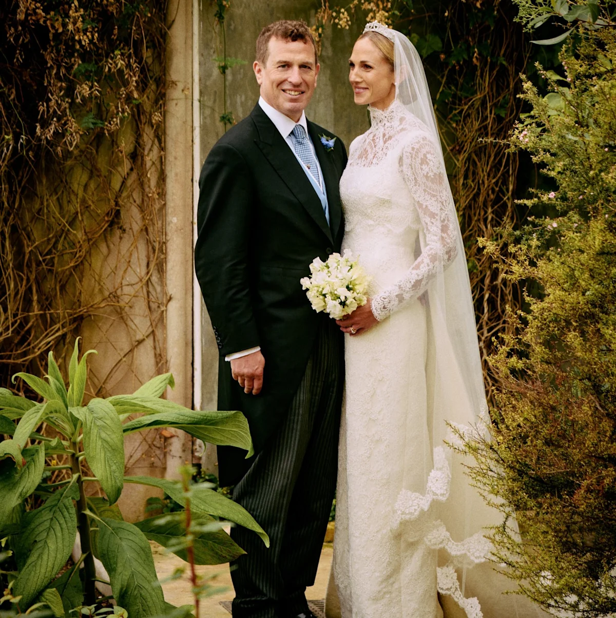 Official wedding portrait of Peter and Harriet Phillips, featuring the couple in elegant attire, with a beautiful colour palette and stunning scenery, capturing their love and happiness on their special day