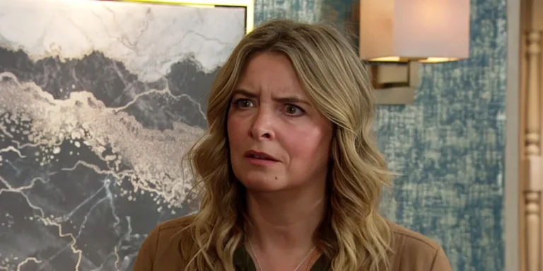 A dramatic scene from Emmerdale, featuring Charity, with a concerned expression, as the villagers look on with worry, set against the colourful backdrop of the village, with the primary keyword phrase Emmerdale spoilers naturally included