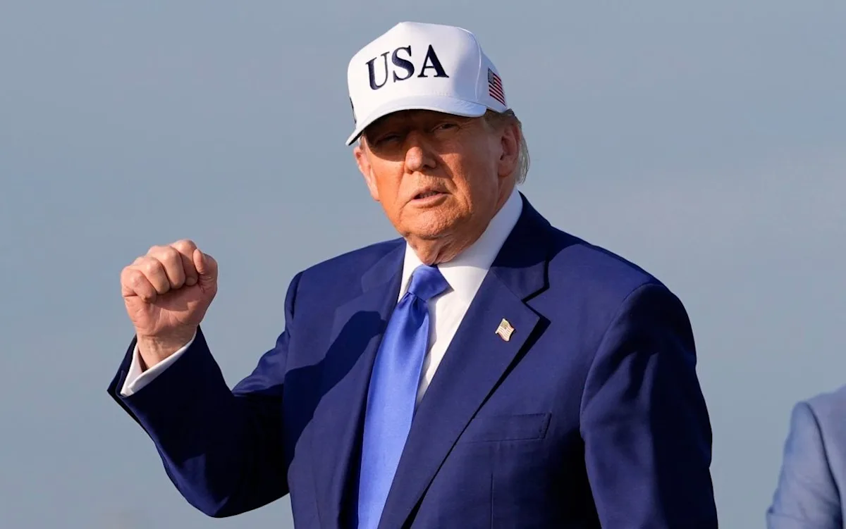 Nato headquarters in Brussels, with a flag of the organisation in the foreground, symbolising the 'pay to play' approach to defence cooperation and global security