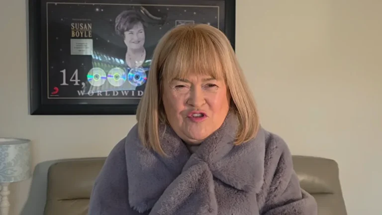 Susan Boyle standing in front of her new £245,000 bungalow, with a warm and welcoming smile, showcasing her love for her new home and the colour of the walls, with a glimpse of the beautiful surroundings and the sound of birds singing in the background, highlighting her primary keyword of Scottish singer