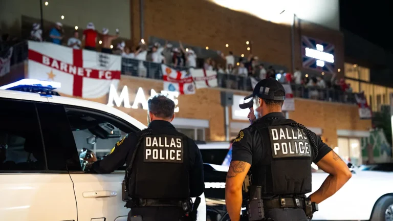 England fans celebrating and cheering on their team with beers and flags, showing their team spirit and colourful behaviour, as they prepare for the World Cup opener
