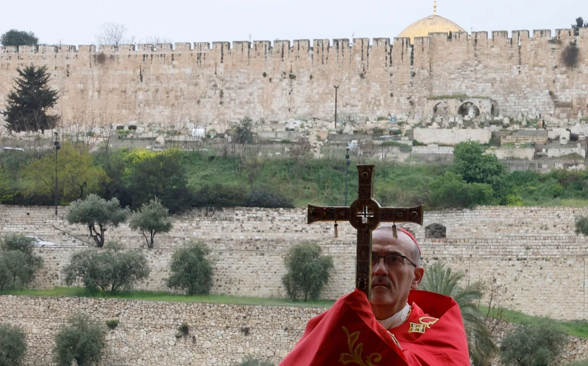 A descriptive image of the holiest Christian site, with a cardinal in the foreground, highlighting the significance of the site and the controversy surrounding Israel's decision to block the cardinal from entering, with a beautiful colour scheme and intricate details, showcasing the site's beauty and importance