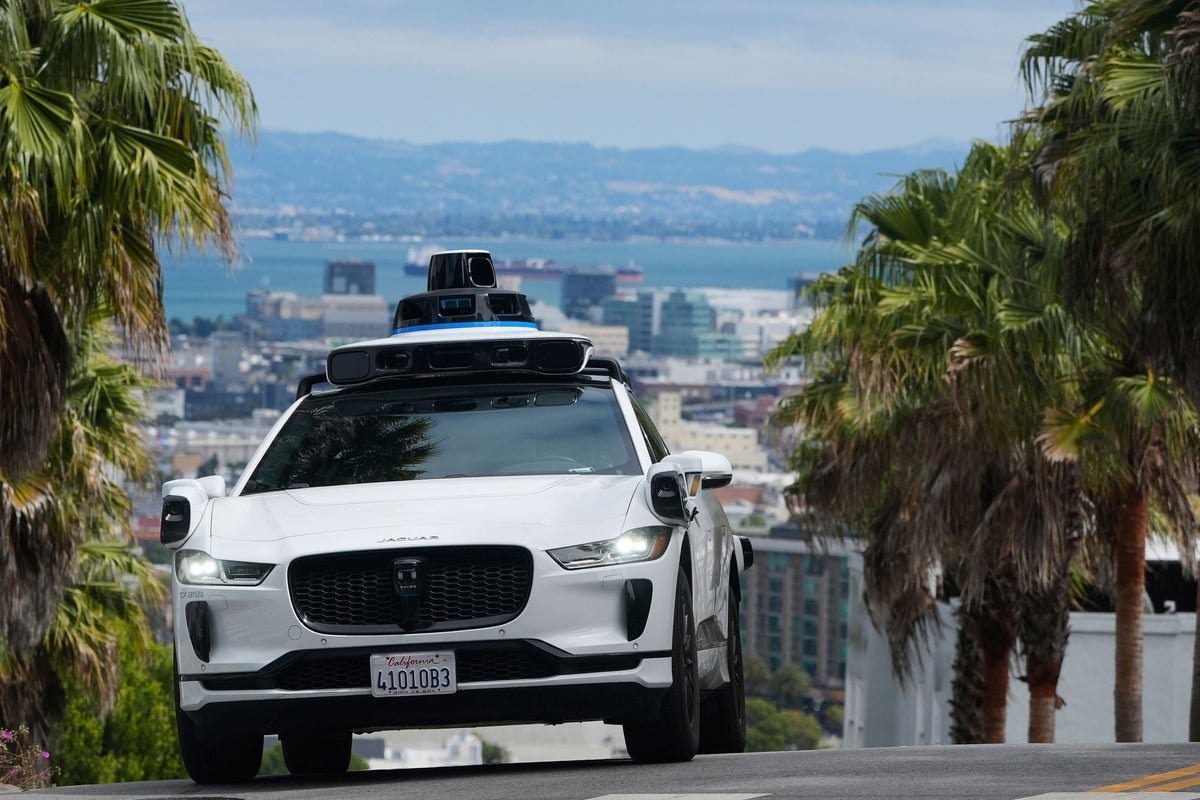 UK robotaxis protest self-driving cars
