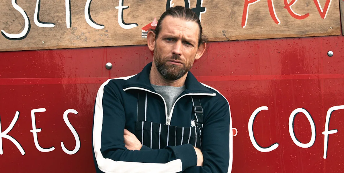 Kev's return to Emmerdale is a significant moment in the show's history, with a big change that will impact the storyline, featuring the character in a dramatic pose