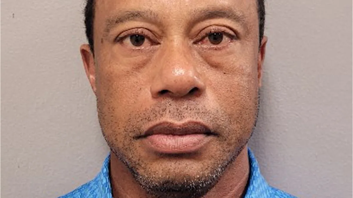 Tiger Woods, the renowned American golfer, has finally broken his silence on the DUI arrest that sparked a media frenzy, with a featured image of Woods in action on the golf course, showcasing his skill and determination, with a beautiful colour palette and striking composition, highlighting the primary keyword of Tiger Woods